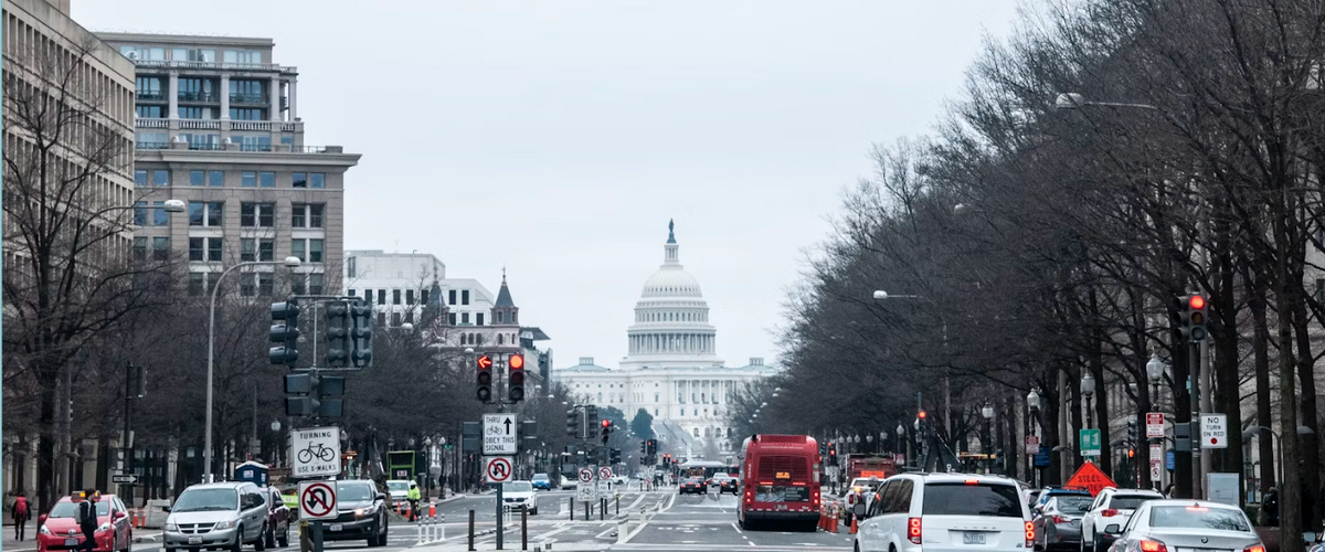 Zoomed out street image of capitol building